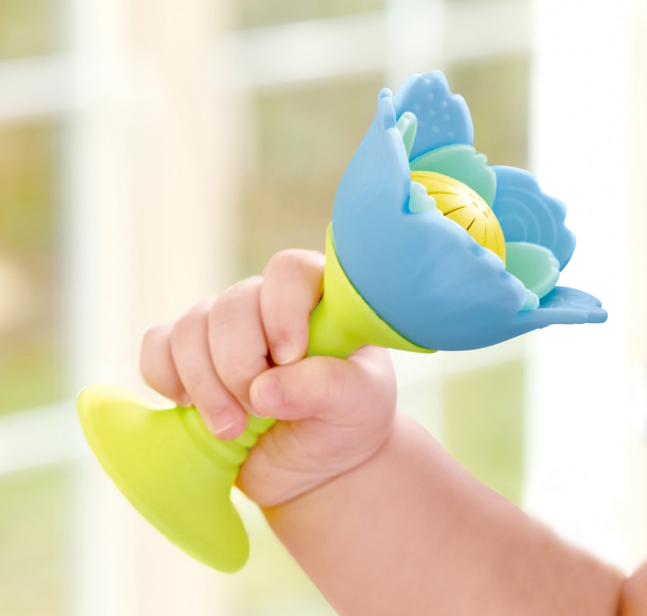 Sonajero flor silicona Celeste