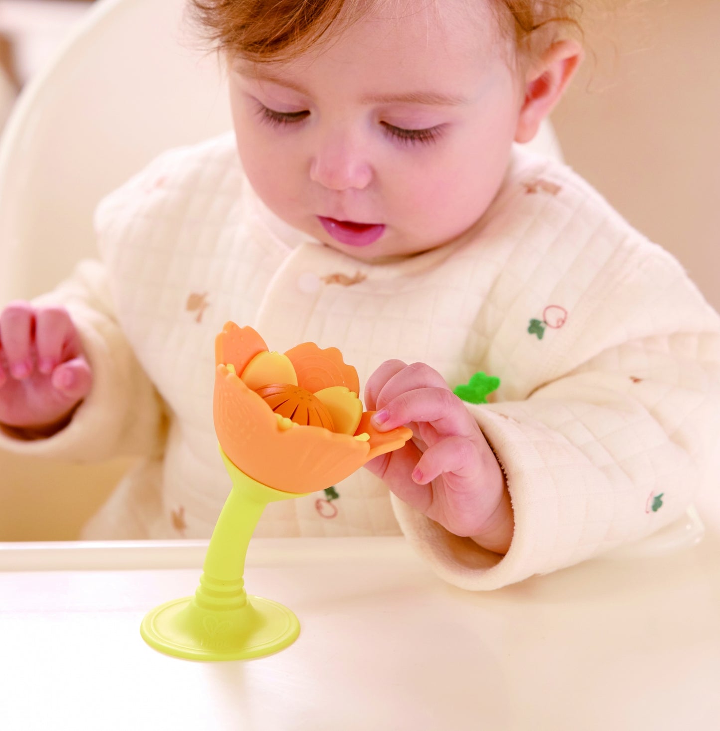 Sonajero flor silicona Naranjo