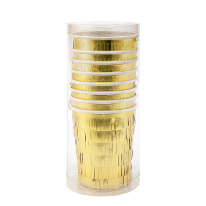 Vasos con tiritas doradas